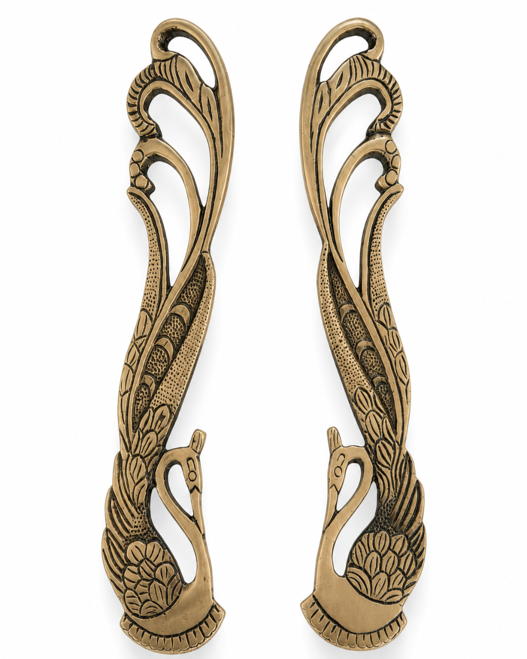 A pair of ornate antique bronze door pull handles featuring a peacock design with detailed feather and body engravings, set against a plain white background.