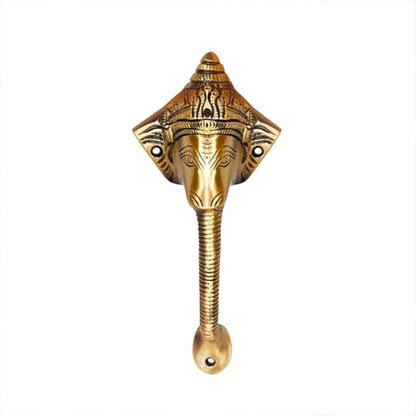 Decorative Antique Ganesha brass door handle with white background.