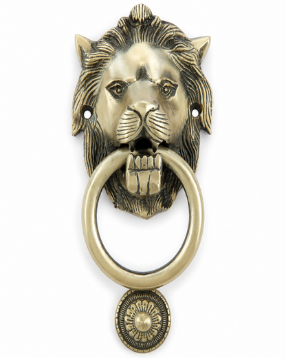 An antique brass lion head door knocker with a matching pull ring and a decorative medallion below, shown against a plain white background.