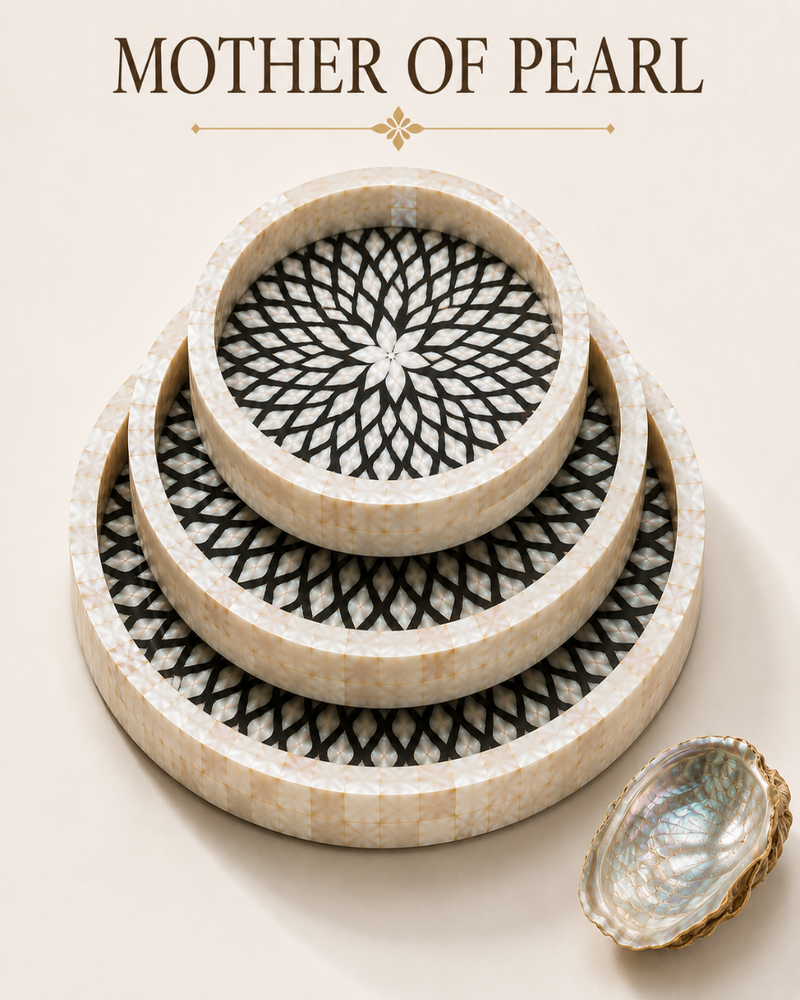 Three nested round trays made of mother-of-pearl with black lattice-patterned centers, shown on a warm beige background with the text 'MOTHER OF PEARL' above and a small abalone shell at the lower right.