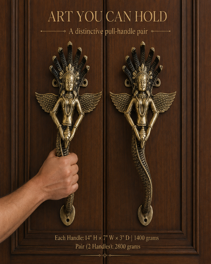 A pair of brass door pull handles with winged female figures and serpent-like lower bodies, mounted on a dark wood door. A human hand is gripping one handle, and text at the top and bottom describes the product.