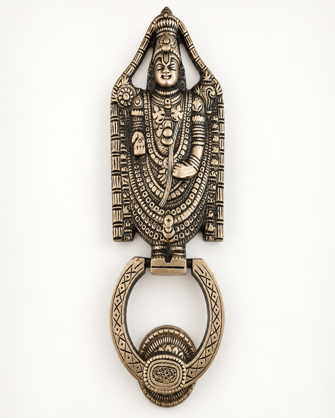 An ornate antique bronze door knocker featuring a detailed relief carving of a Hindu deity, shown on a plain white background.